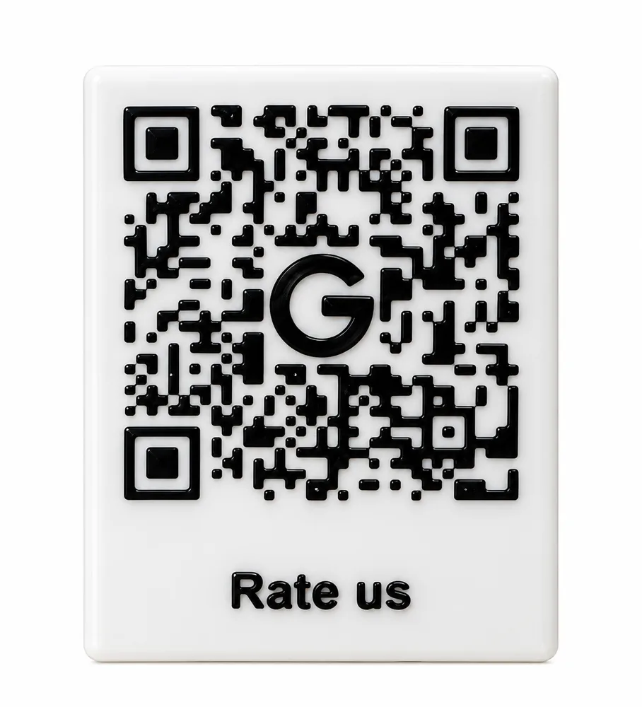 A 3D printed counter plaque with a QR code and the words Rate us